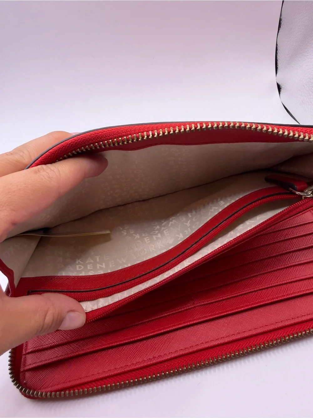 Kate Spade New York red Saffiano leather extra large zipper round wallet